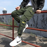 Classic Streetwear Casual Men Ribbons Harem Jogging Pants Male Slim Fit Spring Cargo Pants Multi-Pockets Women Trousers Jo