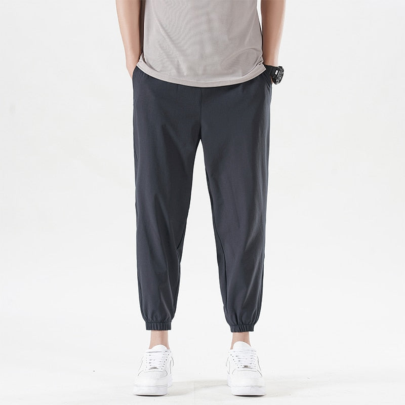 New Summer Men'S Casual Ice Silk Pants Korean Trend Loose Straight Tube Thin Harlan Trousers Quick Drying 9-Point Sweatpants