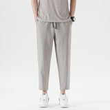 New Summer Men'S Casual Ice Silk Pants Korean Trend Loose Straight Tube Thin Harlan Trousers Quick Drying 9-Point Sweatpants