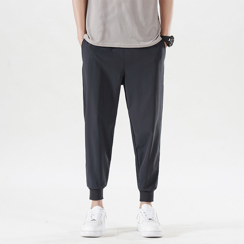 New Summer Men'S Casual Ice Silk Pants Korean Trend Loose Straight Tube Thin Harlan Trousers Quick Drying 9-Point Sweatpants