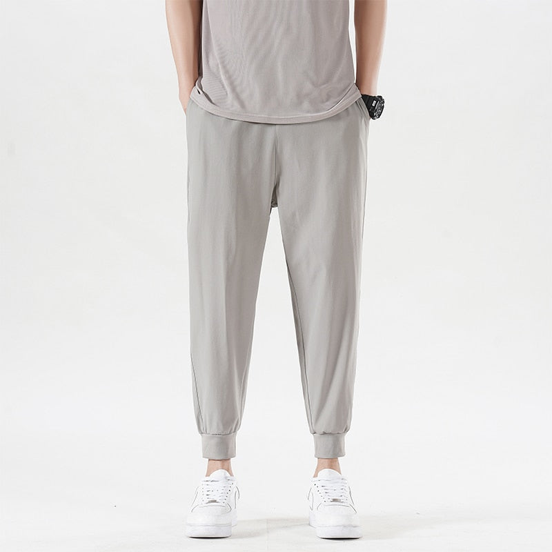 New Summer Men'S Casual Ice Silk Pants Korean Trend Loose Straight Tube Thin Harlan Trousers Quick Drying 9-Point Sweatpants