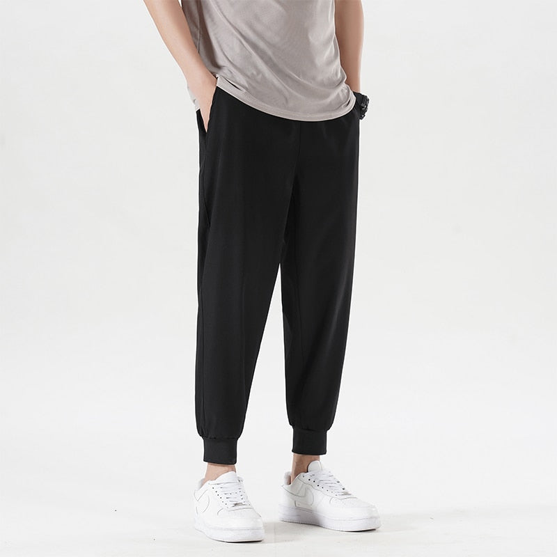 New Summer Men'S Casual Ice Silk Pants Korean Trend Loose Straight Tube Thin Harlan Trousers Quick Drying 9-Point Sweatpants