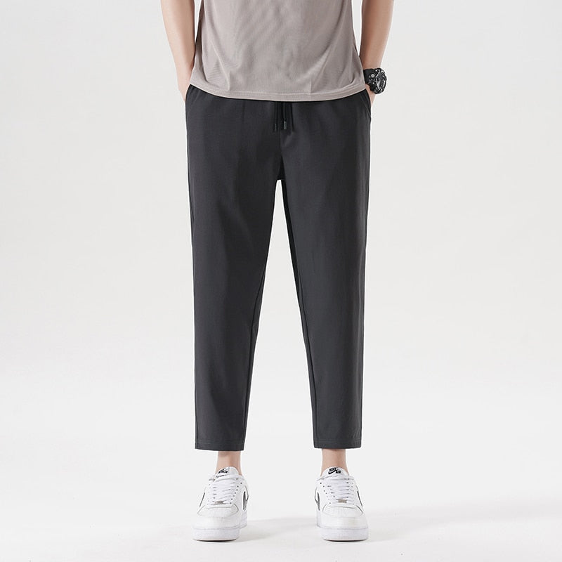 New Summer Men'S Casual Ice Silk Pants Korean Trend Loose Straight Tube Thin Harlan Trousers Quick Drying 9-Point Sweatpants