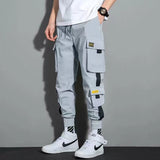 Classic Streetwear Casual Men Ribbons Harem Jogging Pants Male Slim Fit Spring Cargo Pants Multi-Pockets Women Trousers Jo