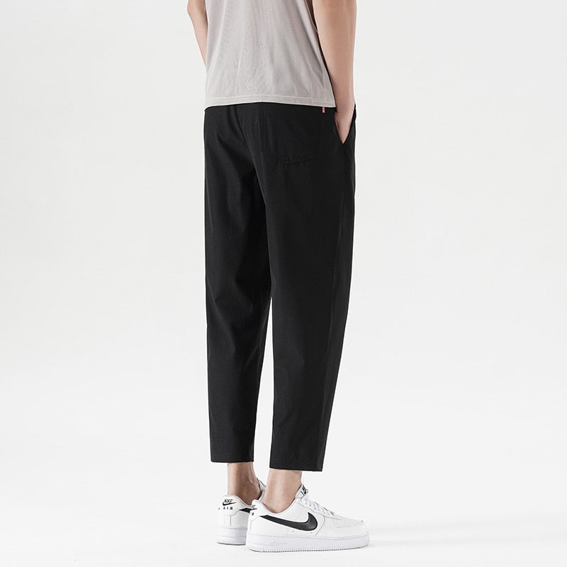 New Summer Men'S Casual Ice Silk Pants Korean Trend Loose Straight Tube Thin Harlan Trousers Quick Drying 9-Point Sweatpants