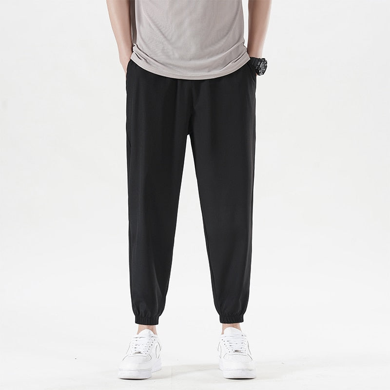 New Summer Men'S Casual Ice Silk Pants Korean Trend Loose Straight Tube Thin Harlan Trousers Quick Drying 9-Point Sweatpants