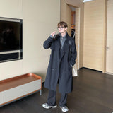 Trench lungo a doppio petto