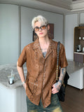 Niche retro jacquard hollow design short-sleeved shirt men summer new lazy style lapel shirt trend