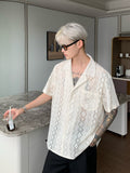 Niche retro jacquard hollow design short-sleeved shirt men summer new lazy style lapel shirt trend